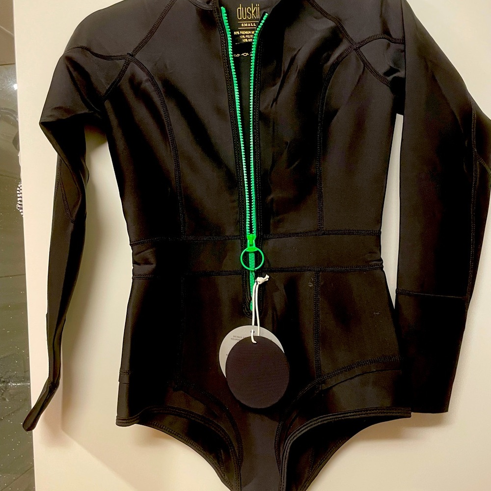 DUSKII: Disjointed Gisele wetsuit.New w/ tags